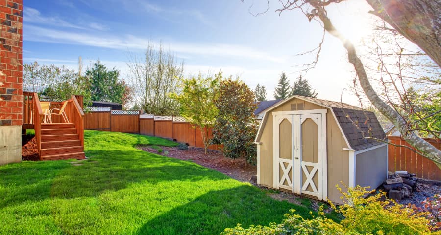 Fenced backyard with storage shed in Camden